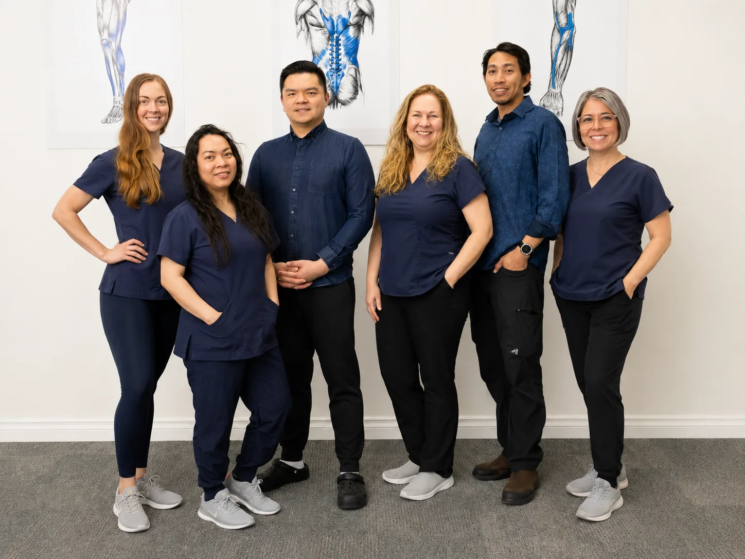 The full A-Game Care team together in the clinic, natural and relaxed
